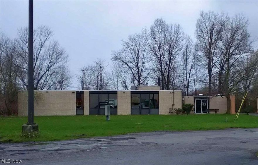 Former Niles City School District administration building and reading trailer situated on a large corner lot. Tons of potential with over 5,000 square feet of office, classroom and storage space. Solid brick building includes vault. Price to sell!