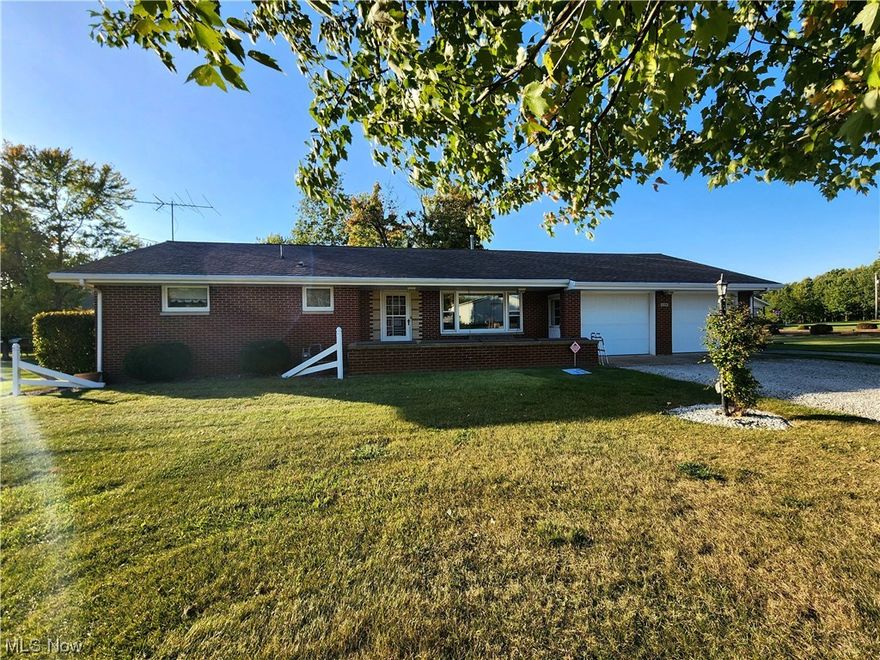 3 BEDROOM HOME AND MORE !  This ranch home offers 3 bedrooms all on the main floor,  an equipped kitchen with a nice dining area,  spacious living room with a large window for natural light.  French doors off the kitchen on to a wood deck with screened in porch area.   This home has a full house generator.  Public sewer hook up in 2022.  Central vac system with all components.  Roof on the home was replaced in 2015  The attached house garage is 775 sq ft with heat, water/ drain.   The laundry room and a full bathroom is currently located in the garage but can be placed back in the full basement.  A detached second garage features a 608 sq ft RV area, and a 832 sq ft workshop area with electric, heat and water and its own 200 amp service breaker box.  There is also a 12 x 20 shed with electric. This home sits just outside of town and is a must see.  Call today for your private showing.