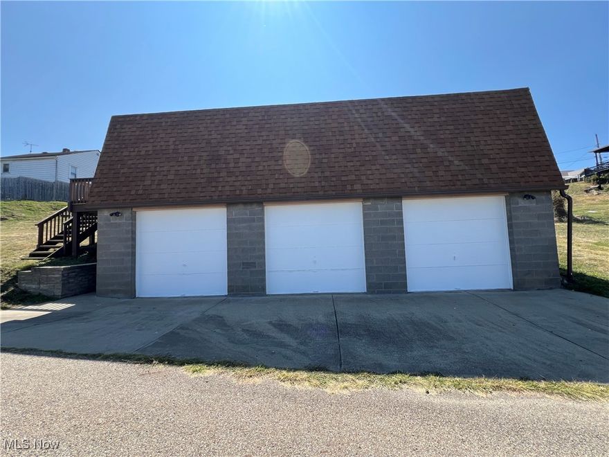 Need garage and storage space? This 1000 sq ft, 3 car heated garage located in Weirton, WV has what you're looking for ready to go. Roof 10 years old, 200 amp breakers, siding 2013, freshly painted interior and 9ft garage doors, 2 automatic garage door openers and a full second level with flooring and wiring that presents endless possibilities situated on a double lot. An opportunity like this does not come along often. Don't waste time calling to schedule an appointment today. Reasonably priced at $89,900.