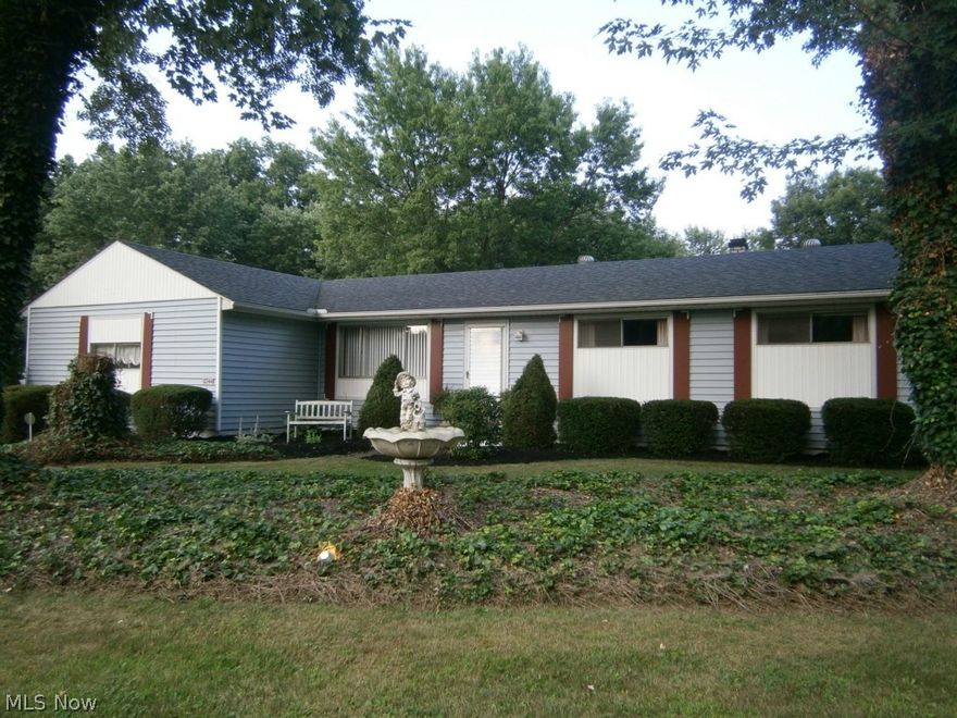 Spacious ranch home in Marlington School Disctrict with a finished walk-out basement.  This 3 bedroom home is located on a beautiful setting with a mother-in-law suite.  The freshly painted main floor includes a large living room, spacious family room and updated kitchen with new flooring.  Also located on the main floor you will find a fireplace, spacious bedrooms and separate door to a welcoming 32 X 14 screened in porch.   The lower level of this home has a mother-in-law suite that includes a living room, kitchen, bedroom and a full bath.  In addition, the mother-in-law suite also has its own private entrance and lovely 32 X 14 screened in patio.  There are many updates to this home including landscaping, newer roof, newer gutters, new well water pump, new electric box & updated service.  Don’t miss out on this great opportunity for this wonderful home on a sizeable lot!