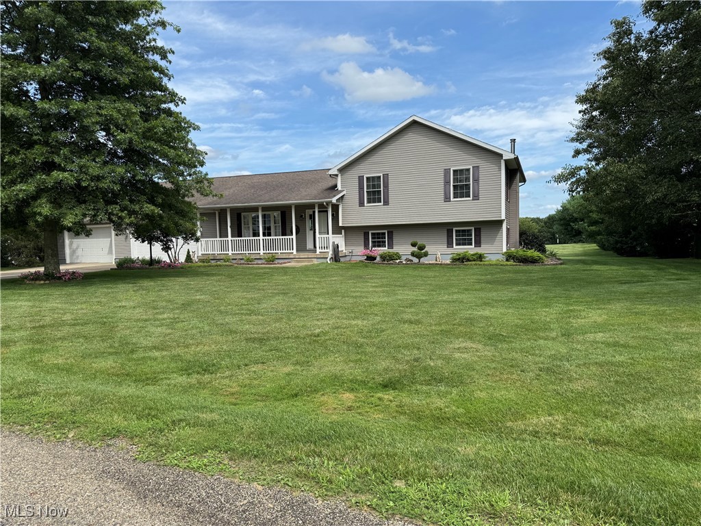 Welcome to this beautifully maintained multi-level home nestled on just over 2 acres in the Tri-Valley School District. Step inside to an inviting open concept living room and kitchen, where gleaming granite countertops and abundant cabinetry draw your eye from the moment you walk in. The custom fireplace with built in cabinetry make for perfect cozy evenings. A four-seasons room offers a second fireplace and stunning views - perfect for relaxing year-round. Downstairs includes an additional family room with a third fireplace, office/bedroom and a utility room. Upstairs you'll find a large primary suite with walk in closet and master bath. Two more bedrooms and a second convenient bath in the hall. There's also a first-floor laundry and half bath. Hardwood floors. Outside, enjoy peace and privacy from the deck overlooking the scenic countryside. Please see supplement for Update and Improvement list. Many extras.
