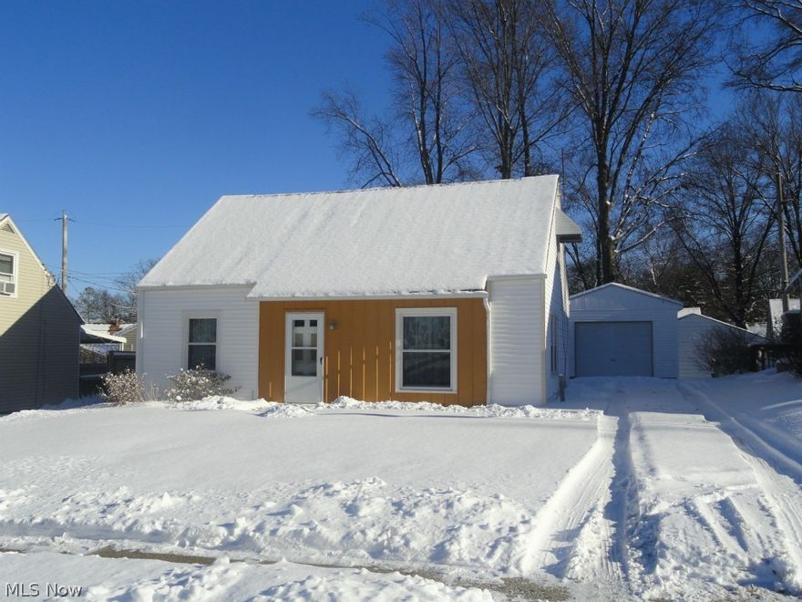 Cute cape close to elementary school with several updates.  Just needs some interior TLC.  Newer windows, electrical panel, roof, furnace, a/c and water heater, all in the past 8 years. Nice covered patio and partially fenced backyard.  Detached garage.  1st floor bedroom also plumbed for laundry.