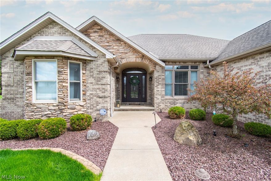 The one you've been waiting for...this four bedroom, ranch home in Tuscany Estates has be completely updated from top to bottom and is move in ready! Enter through the foyer and you will be greeted by the great room with vaulted ceiling, an abundance of natural light, new white oak luxury vinyl flooring and a gas fireplace. Open to the great room is the recently remodeled eat-in kitchen complete with quartz countertops and stainless steel appliances that stay. Past the kitchen in the Butler's panty which has plenty of storage, counter space, and built-in wine fridge. Master bedroom includes a walk-in closet with laundry and an ensuite with soaking tub and separate, custom tiled shower. Three more large bedrooms, sun room, and an office with tray ceiling and wainscoting conclude the main floor. Basement is finished with a wet bar, full bath, and another room that could be used as a fifth bedroom. Make your appointment today before this one is Going, Going...GONE!