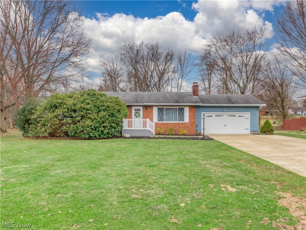 This charming ranch has been cherished & maintained in excellence by the same family for over 50 years. Great curb appeal in an established Tallmadge neighborhood of lovely homes situated on large lots. Extra wide concrete driveway. The new front deck porch steps into a foyer entry. Cozy formal living room with gas fireplace & picture window filling the room with natural light. Hardwood floors in most rooms under the carpet. Kitchen opens to the dining area with sliders to a 3 seasons sun room overlooking the large flat sunny backyard with a patio and 8 x 10 shed. All bedrooms have ceiling fans and double closets. Main bath with large vanity and walk in shower. Attached garage with nature stone floor. Plenty of options in the lower level with a rec room, private office, workshop room, laundry room plus storage room. New windows & refrigerator in 2020. New HVAC in '17 & new garage door & opener in '10. Home Warranty included. This home is beautiful, clean and bright throughout!