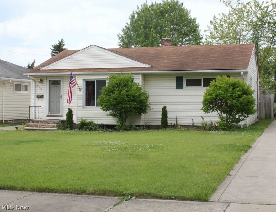 Welcome to this  3 bedroom ranch home on a charming tree lined street.  The updated kitchen opens to large family room with vaulted ceilings and skylights.   Includes wood burning fireplace/stove.  French doors open to a deck with gazebo and private fenced backyard.   Original restored hardwood floors throughout.  Two car attached garage,  partially finished basement with newer block windows.