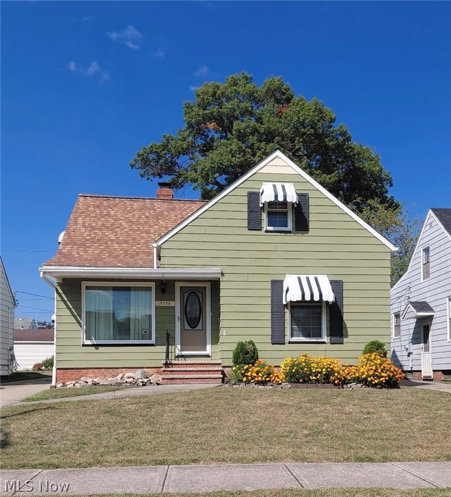 Come check out this wonderfully maintained home, cared for by the same owner for the last 30 years. Located on a quiet street, this property offers both comfort and peace of mind with new windows in 2023, new water tank in 2019, newer roof in 2015 and garage siding in 2024. Kitchen has custom built cabinets and dining area. Relax year round in a the enclosed sunroom just off the kitchen. Come make this place your home!