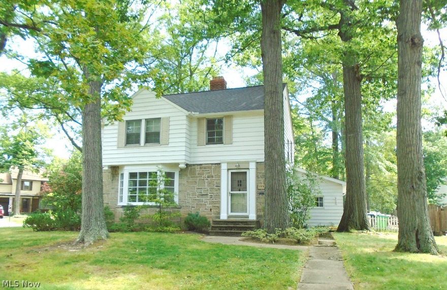 A beautiful, spacious home with plenty of natural light!  This home has up and down wood burning fireplaces in the living room and finished portion of the basement, a large second-story deck off the master bedroom, and a substantial deck off the sun room, adjacent to a patio. 
Many original features still remain: hardwood flooring throughout, original hardware, bathroom tile, and a built-in cupboard in the dining room.  Updates have maintained the original character of the home, like ceramic flooring in the sun room and newly tiled kitchen backsplash.  The home has a newer roof ('12) and hot water tank ('11), and all appliances in the home will stay.      
This home is situated on a nicely landscaped corner lot on a quiet street - a serene place to call home!