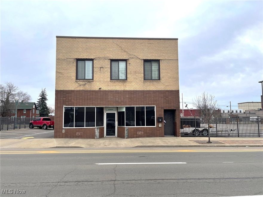 This very well maintained two-story brick building is located on .73 acres on the corner of Walnut Ave. NE and 6th St. NE. It has 8,910 sf on the first and second floors and 2,310 sf of space in the lower level for a total of 11,220 sf.  The front of the building has a spacious retail space and the back of the building has a spacious workshop space with 3-phase electric. There are offices on the second floor. The second floor features a receptionist area, two restrooms, a kitchen with cherry cabinetry and breakfast bar. Kitchen appliances stay. There is a copy room, file room, spacious open work area and six offices. Some of the offices have built-in cabinetry and desks. There is outside access to the parking lot from the second floor. Spacious lower level for storage. Property is completely fenced in with wrought iron fencing and two electric gates. Huge pole building with overhead door on back of lot. Approximately 38 parking spaces.