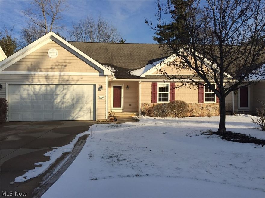 One floor living in quiet, private community, convenient to both downtown Kent and Stow area.  Open floor plan includes great room with cathedral ceiling, kitchen and eating area; sliding door leads to deck and lovely view of the peaceful pond.  Gas fireplace in the great room.  Master bedroom with private bath and large walk-in closet also has a view of the pond.  First floor laundry with additional storage; washer/dryer negotiable.  Guest room and additional full bathroom complete the main floor living space.  Full unfinished basement provides excellent storage, or potential for expanded living space.  Handicap accessible ramp in the garage can stay with the property or can easily be removed by seller if desired.