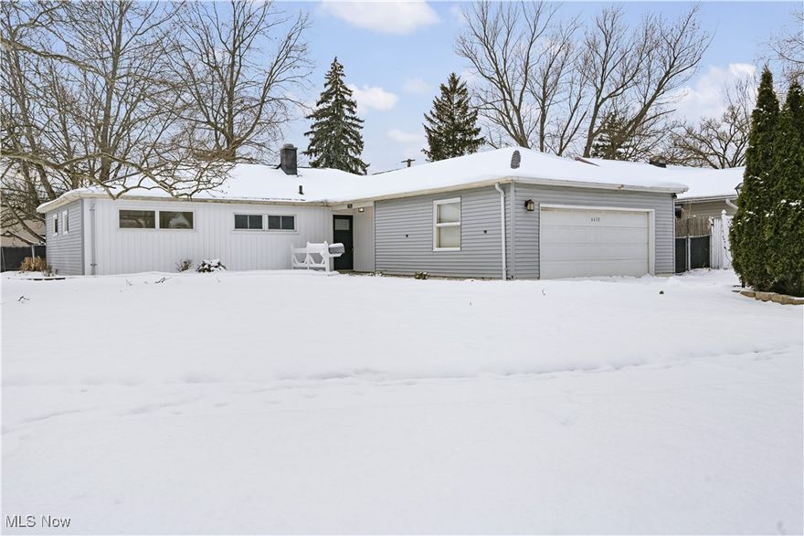 Beautiful 4-bedroom ranch situated on a desirable corner lot with a fully fenced backyard. The kitchen is the centerpiece of the home, featuring custom Amish-built natural hickory cabinetry, quartz countertops, and a tile backsplash. Open-concept family and dining areas create an inviting space for everyday living and entertaining. Convenient first-floor laundry is located off the garage. Enjoy the sun-filled sunroom offering abundant natural light. The home includes a brand-new bathroom with a tiled shower, four first-floor bedrooms, and numerous updates including newer siding, roof, select windows, updated electrical and plumbing, fresh paint, and new flooring. The backyard offers a covered patio, perfect for outdoor relaxation.