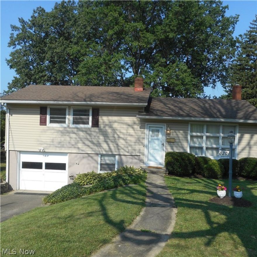 This 3 Bedroom, 2 bath split level is ready to move into,after you see it!
The back yard is spectacular with a 400 square foot deck with railings that you walk out to ,from the sunroom.
The eat in kitchen with a breakfast bar includes all the appliances.The open floor plan into the dinning room and then into a large living room.
The family room includes a fireplace.
There are closets everywhere, and storage areas everywhere.
The second garage has a driveway off of Hughes Ave.