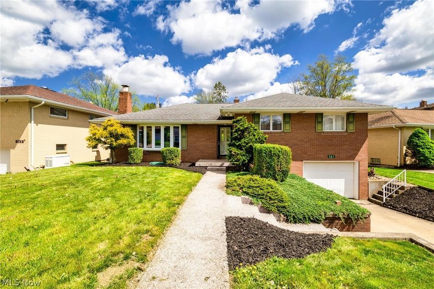 OPEN HOUSE SUNDAY 4.19.26 12PM-2PM!  ELEVATED LIVING, EXCEPTIONAL LOCATION! Experience refined living in this exceptional tri-level residence, ideally situated in one of Wintersville’s most sought-after neighborhoods. Lovingly maintained and held by just two families since it was custom built in 1960, this home offers a rare blend of heritage, quality, and modern sophistication.  At the heart of the home, the dramatic great room showcases a striking beamed vaulted ceiling, creating an impressive yet inviting space for both everyday living and elegant entertaining. The kitchen is appointed with premium Schrock cabinetry, delivering timeless craftsmanship and functional design, complete with additional area for coffee/wine bar.  Upon entry the seamless living and dining room combination offers effortless flow.
The primary suite features generous his-and-hers closets, complemented by a beautifully updated upper-level bath with a quartz double vanity, blending style with comfort.  Designed for both relaxation and versatility, the lower level presents a warm and inviting rec room anchored by a wood-burning fireplace, along with a flexible space ideal for a home office, additional bedroom, or personalized retreat. A full bath with walk-out access enhances convenience and guest accommodations.  Step outside to your newly remodeled outdoor living area and expansive deck—an ideal setting for upscale entertaining or quiet evenings. Additional highlights include an attached garage, upgraded 220-amp electrical service (2026), and fully paid solar panels, offering both efficiency and long-term value.  A rare offering that combines enduring quality, thoughtful updates, and an exceptional location—this is a home that truly stands apart.