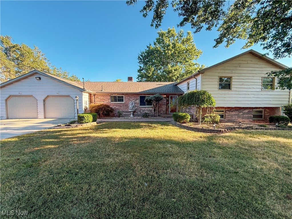 Set on over an acre, this 4-bedroom, 3½-bath home gives you the privacy of a country setting while being only 2 minutes from I-77 and just a short drive to Parkersburg.
Inside, you'll find:
A welcoming living room and an oversized family room, each with a wood-burning fireplace.
A bright kitchen with a breakfast nook, conveniently connected to the dining room.
A dining room that opens to a 12' x 25' covered porch overlooking the fully fenced backyard.
Upstairs: three bedrooms and two full baths.
Lower level: a family room, office, laundry room, and another full bath.
Natural light pours in through large windows and sliding doors throughout the home.
Car enthusiasts and collectors will love the SIX garages, two attached and four detached.
The seller is transparent about one important detail: the foundation needs a repair. A professional structural engineering report and contractor's quote to remedy are attached for review, and funds for the repair will be escrowed at closing.