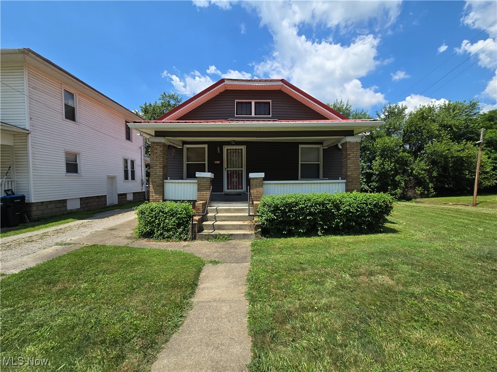 Great opportunity on this centrally located bungalow! Tons of updates including roof, siding, windows, HVAC and water heater. 2 Bed 1.5 Baths! The large living room has a fireplace and connections to the formal dining. Large Kitchen and Updated Bath. The full, walk out basement has a half bath, possible bedroom, and is a blank canvas! Off street parking with carport. Easy access to fishing in the canal! Affordable living and ready for your updates.