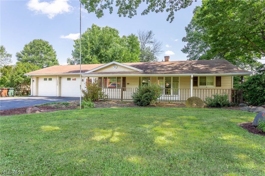 Welcome home to 13229 Durkee Rd., where you will find all the amenities of the city, but the tax benefits of a township!  Imagine sitting in your 3 season sun room, sipping your coffee, and looking out to your back yard, gazing at the beautiful fall foliage.  This spacious 3 bedroom, 2 full bath ranch boasts 1440 square feet.  The living room and bedrooms have stained hardwood flooring. The eat-in kitchen area will lead you to the back of the home, where you will find the 2nd full bathroom , larger family room and office. The 2nd bathroom and office have larger doorways to accommodate a wheel chair.   When leaving the family room, you will find the large 3 season sun room and concrete patio!  This looks out to your large back yard, with a scenic country feel.  The backyard also has a 2 car, 20x20 out building and, 16x12 shed.  There is plenty of room to make a workshop or rec area.  The larger 2 car garage also has a small work area, convenient for small projects.  All appliances stay,