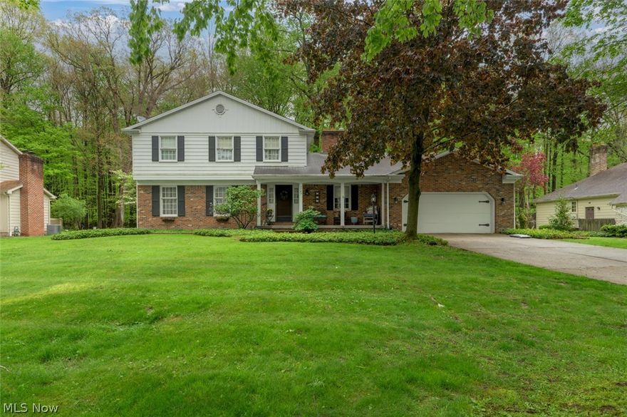 Welcome home to this beautiful colonial tucked away in the desirable Hitchcock Woods neighborhood of Boardman. Situated on a spacious lot with mature trees and great curb appeal, this 4 bed, 2 full and 1 half bath home offers over 2,100 sq ft of comfortable living space designed for everyday living and entertaining alike.

Inside, you'll find a warm and inviting layout featuring generous room sizes, a cozy fireplace, updated finishes and plenty of natural light throughout. The attached 2-car garage, central air and partially finished lower level add even more functionality and convenience.

Enjoy peaceful evenings in the backyard, morning coffee on the charming front porch and the comfort of being close to shopping, dining, perks and everything Boardman has to offer.