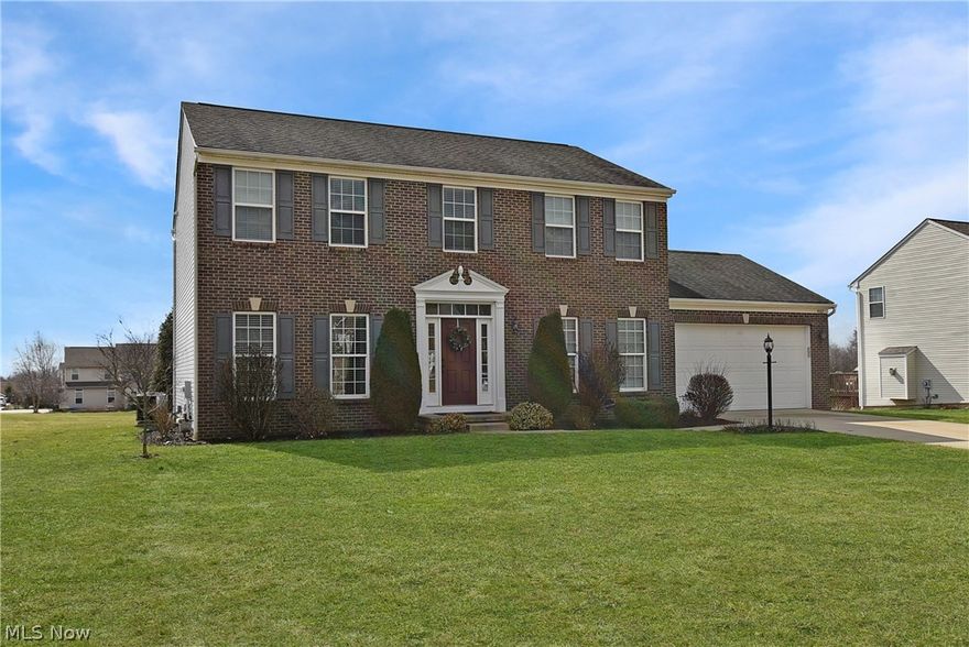 Stunning Brick front Colonial with 4 bedrooms and natural soft colors throughout! Prime Location! City water, sewer, & sidewalks! Spectacular kitchen with wood floors, custom cabinets with granite counter, pantry, stainless appliances all stay. Morning room has cathedral ceilings. Beautiful Family Room w/fireplace, formal Dining Room, Den/Living Room, 2nd floor laundry room. Owner's suite with walk-in closet, glamour bath & tile shower.  Finished basement with Great Room, playroom, half bath, and storage area. Private, flat back yard with custom patio and a large storage shed. A true pride of ownership! Low property taxes and award winning schools.  This home is conveniently located near I-77, I-271, dining, shopping, parks, & many other local attractions. Great value! A True Must See. Don't miss this fine home!