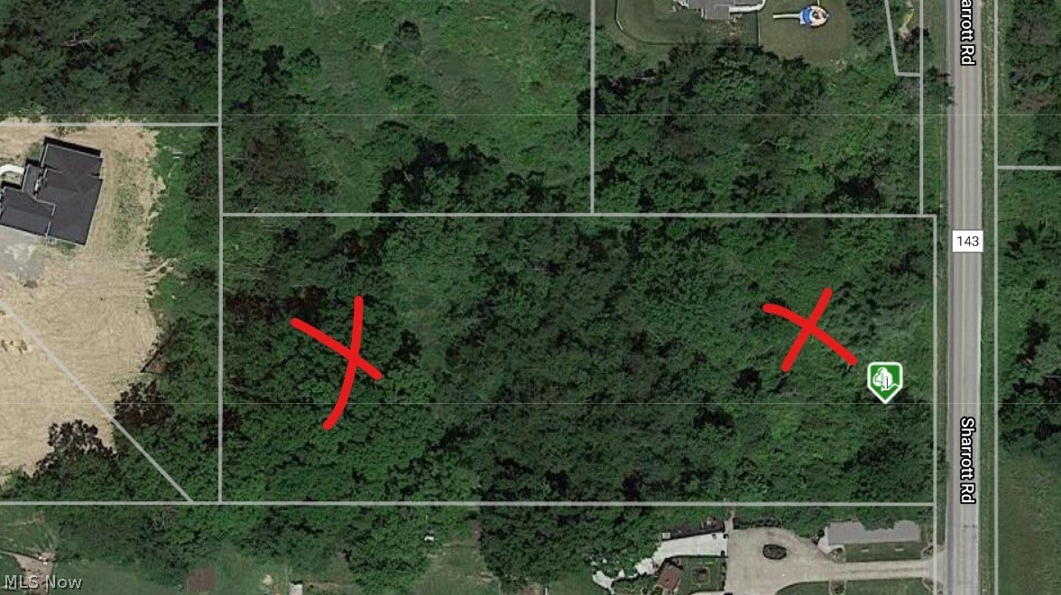 This is the perfect beautiful lot to build a custom home nestled in the woods but just a moment away from shopping and entertainment. Public water/ sewer and natural gas available.