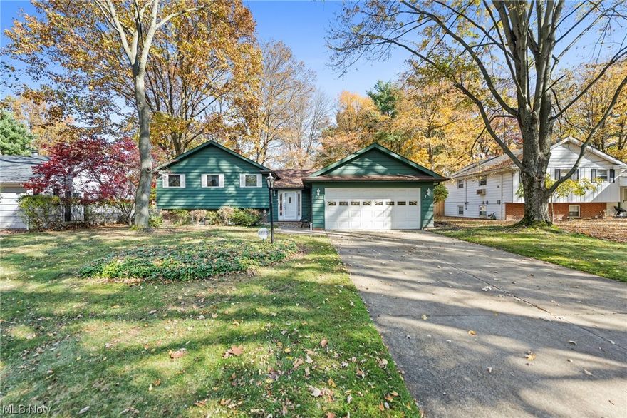 Welcome to 327 Claymore Blvd! Spacious 3-bedroom split-level home nestled on a quiet street. Host your next family gathering in the breathtaking family room with vaulted ceiling, skylight, hardwood floors, wood burning fireplace, wall of windows overlooking the rear yard, and sliding door to rear deck. A formal living room is highlighted by a bay window and opens into the formal dining area. Eat-in kitchen with ample cabinets and a built-in desk; all appliances included. A half bath off of the kitchen completes the first floor. The second floor with three bedrooms and a full bath with a large vanity and lots of storage. Your living space continues into the lower level with a finished rec room with a wood-burning fireplace and a bonus room that could be used as a game room or a home office, laundry, and storage area. Enjoy a relaxing evening in the fully fenced-in deep rear yard. Attached a two car garage. Buyer to assume City of Richmond Hts. POS violations. Great location close to Euclid Creek Reservation, golf course, shopping, and restaurants. Call us today to schedule a time to see it!