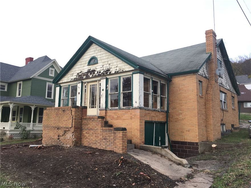 4 bedroom / 2 full bath home with loads of potential! 2 main floor bedrooms and a full bath.  2 bedrooms and bath upstairs. Enclosed front porch/sun room. Enclosed breezeway between the house and 1 car garage. Seller to retain mineral rights.