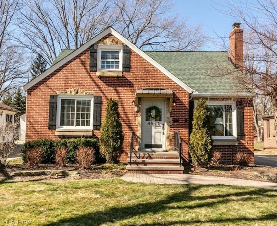 A charming front exterior brick walkway is the perfect intro to this recently renovated all-brick bungalow that has been perfectly fine-tuned to provide a more modern, functional space. The interior has freshly painted pale white walls partnered w/ newly refinished hardwood floors in a rich walnut hue. A quaint, yet open living room awaits w/ beamed ceiling, wood-burning fireplace, board & batten feature wall that leads to the newly reconfigured kitchen w/ new SS appliances, quartz countertops & subway tile backsplash. Two cozy bedrooms & full bath complete the first floor. Upstairs a spacious master bedroom w/ dormer area (perfect for home office) resides. The lower level is home to a newly added den that showcases a shiplapped fireplace wall w/ new electric fireplace. An all new full bath, laundry room, storage room & mechanicals round out this space. Outside the spacious backyard has a newly added deck & newly sided garage w/ new garage door. The improvements extend to the front of