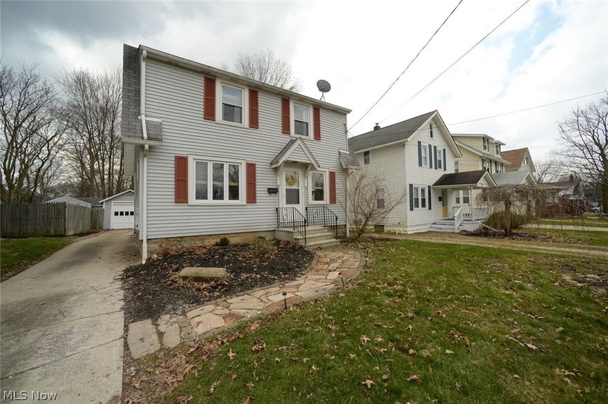 Perfect Cuyahoga Falls colonial!  You will be blown away at how well maintained this home is and the kitchen will seal the deal!  Walk into the well spaced living room with gorgeous hardwood floors and a charming fireplace.  The classic formal dining room is just the right size and features new lighting.  Then into the jewel of the home, the remarkable well renovated kitchen.  Start with the sleek laminate flooring.  Up to the modern, stark white soft close cabinets, stunning granite, endless countertops and under mount sink.  The breakfast bar is a great hang out spot too!  Stainless double door fridge, dishwasher, microwave and gas range all stay.  There is also a pantry around the corner.  The main level coat closet is located at the bottom of the stairs.  Heading up, you will find the bathroom with ceramic tile, newer vanity and great lighting and the 3 bedrooms.  Typical of colonials in the Falls, there is one smaller bedroom, but there is a ton of storage in the hallway to make u