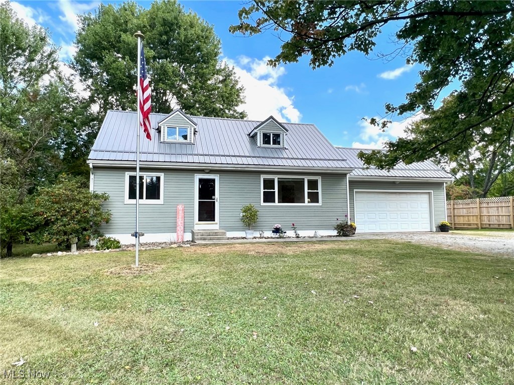 Meticulously Maintained 4 Bedroom Cape Cod set on deep 1+Private Acre! This warm and inviting home has neutral decor & original hardwood floors throughout. Living Room with large picture window & pellet stove. Eat-in Kitchen with newer LVT plank flooring, dining area and all appliances included. Main floor includes 2 Bedrooms with hardwood floors and Full Updated Bath. Second floor includes 2 additional bedrooms with hardwood floors & walk-in storage closet. Full walk-out basement with Rec/Play Room & laundry area, washer & dryer stay. Central air. Updated 100 amp electrical service & panel. New HWT. New Metal Roof 2019. 2+car attached garage. 25x30 metal outbuilding/detached garage includes 6 inch concrete floor w/rebar, (2) 10x12 front & back overhead doors and plumbed for bath. 20x16 Barn w/hayloft for your small animals/livestock has eclectic & water, chicken coup, goat pen & storage shed...ideal for the hobby farmer or 4H projects! Concrete patio & walkways. Enjoy peaceful views of the deep manicured backyard filled with many apple & pear trees along with blueberry & elderberry bushes. This wonderful home is ready for a new family to make their own! Cardinal Schools.