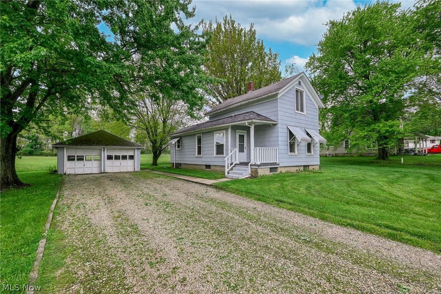 Charming century home situated on .67 acres near the center of Randolph. This 2-bedroom, 1-bath home offers plenty of character and space, featuring a large eat-in kitchen, dining room, spacious living room, and convenient first-floor bedroom. Newer flooring adds an updated touch while maintaining the home's classic charm.

The upper level includes a second bedroom and additional flexible space. Enjoy year-round comfort with central air conditioning. Outside, you'll find a 2-car detached garage and an open pavilion perfect for outdoor gatherings, entertaining, or relaxing evenings. Conveniently located close to town amenities while still offering a spacious country feel.