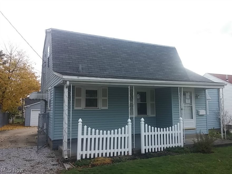 Can't believe it's a foreclosure!!  Pack your bags and move right in this super clean 3 bedroom 2 full bath cutie, complete with white picket fence.  Living room/dining room boasts beautiful gleaming hard wood floors.  Whole house is tastefully painted with soft neutral colors.  Newer windows and exterior doors, big 2 car detached garage, fenced in yard and a nice covered front porch makes this a nice little package you don't want to miss.  Just in time to put on Santa's list!!