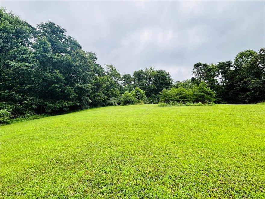 The perfect blend of country charm and convenience! Just minutes from town, this beautiful building site offers peace, privacy, and that quiet country feel you’ve been looking for. The utilities are already in place, and a long driveway leads to a secluded, picturesque spot—ideal for building your forever home. Don’t miss this rare opportunity to enjoy the best of both worlds: serene rural living with easy access to everything you need!