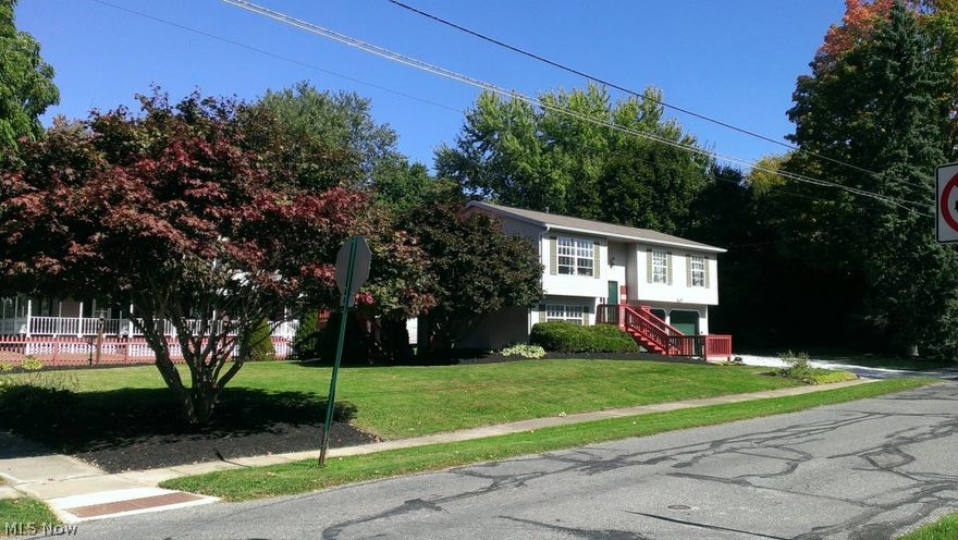 This beautiful home has just been redone to include clean laminate flooring in much of the living area as well as brand new carpeting.  The huge, newly refurbished deck extends the eating area to double the space in warm weather.  A well maintained double garage leads to the lower level with its laundry area, work out or living area, and office space for the student or the bread-winner.   Property is move-in ready with lots of open space as well as three cozy bedrooms and an updated bath with shower and tub. The lower level is all ready for another bathroom, and all of the furnishings can stay if a buyer so desires!  A large side yard makes lots of room for entertaining or family fun.   Come and experience living in this nice, homey, quiet area within a close distance to the historic downtown area of Wadsworth.