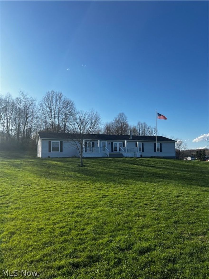 Welcome to this updated ranch style home situated on 2.3 acres of land just outside New Philadelphia.  If your looking for a peaceful retreat away from the city then this is it.  Many updates have been completed as follows.  The hot water tank, A/C unit, garage door , front and back door to the house, all carpet in bedrooms and living room, all lighting to include the outdoors and updated kitchen all in the past two years!  Roof is 8- 10 years ,  The Pella windows are 8-10 years and the furnace is about 8-10 years.  Make an appointment to come and this move in ready home today!