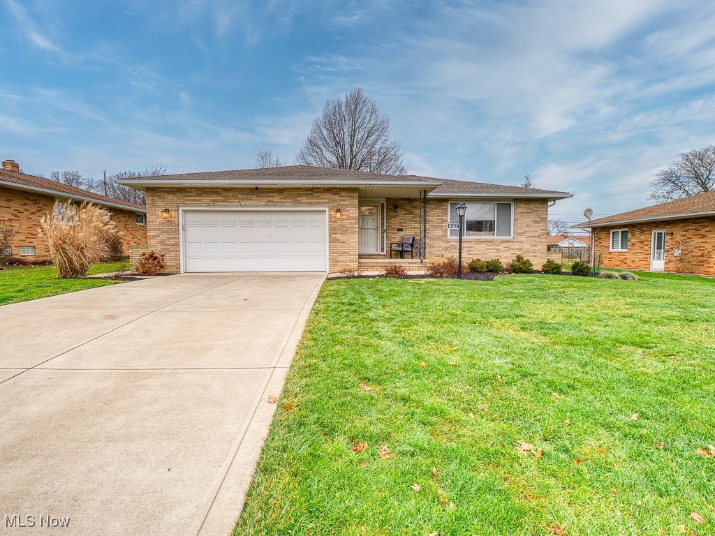 Welcome to your dream home! This FULLY UPDATED all brick ranch boasts 3 spacious bedrooms and 1 full bathroom, along with 2 convenient half bathrooms, making it perfect for both family living and entertaining guests. Step inside to discover an inviting open floor plan that seamlessly connects to both the living room and family room, creating a warm and welcoming atmosphere. In the heart of the home you will find a stunning kitchen adorned with sleek granite countertops and tons of space, ideal for culinary enthusiasts and gatherings! With a generous 1,650 square feet on the main floor, this home also offers an impressive finished basement that adds an additional 650 square feet- bringing it to 2,300sq ft of finished living space!! With the gorgeous bar area in the basement, it’s the perfect spot for hosting friends or enjoying cozy nights in. Nestled in a peaceful neighborhood, this ranch home combines modern updates with classic charm. Not only is this house tastefully remodeled inside, but all major updates have already been done for you including roof, windows, driveway/patio, electrical, HW tank, plumbing, and more!!! Schedule your private showing today and don't miss out on the opportunity to make this fantastic property your own!