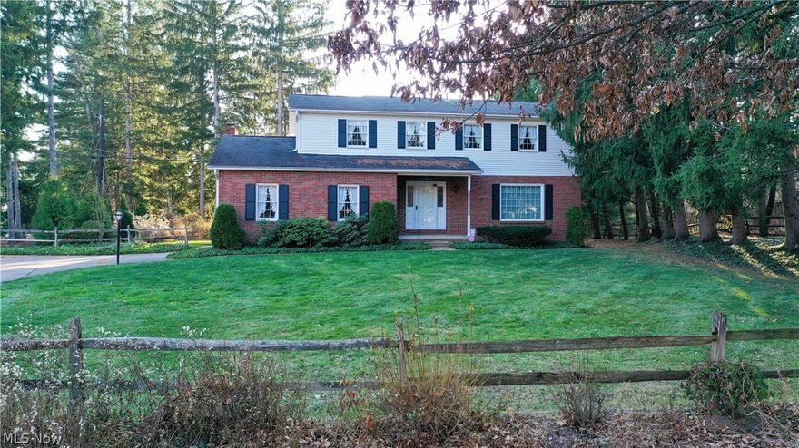262 Ravenna St. Hudson Ohio 44236 is situated very close to downtown Hudson in the heart of it all, yet sitting on over three & a half acres, this property has some features sure to catch your attention. One such feature, the gas rights come with the well on the property & the freedom of not paying a gas bill! Do you have horses & want to keep them on your property? There is an awesome outbuilding once used for their horses, allowing them to roam the open area around the back of the property. The building can be for your animals or your workshop, hobby shop, hunt lodge or it can be converted to a wonderful "barnaminium" for entertainment space for you & your guests to overlook the picturesque pea shaped pond to watch the sunsets reflecting off the water, your own personalized space. Beyond the property amenities the house has been well taken care of for years & is ready for its next owners! This colonial home has 4 great sized bedrooms all upstairs with 3 bathrooms, a partially finishe