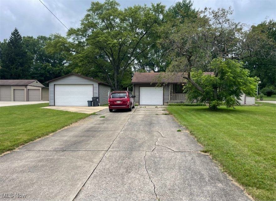 Clean 2 bedroom vinyl sided ranch features living room, tray ceilings, large eat in kitchen with appliances, and window ceilings stay. Laminate flooring throughout. Every room has ceiling fan. Attic fan. First floor laundry with washer and dryer. Full basement. Central Air. Attached single car garage plus detached double car garage with electric and water. Nice front porch on almost 1 acre. Lots of extras.