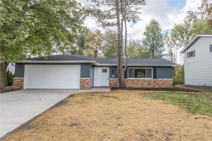 Beautifully remodeled 3 bedroom, 2 full bath Split Level. The exterior boasts a new roof, driveway, landscaping, patio, light fixtures, garage door, fresh paint, exterior doors and windows. The brand new interior showcases refinished hardwoods, new wood laminate flooring, plush carpet, neutral paint, recessed lighting & light fixtures and beautiful millwork details throughout! Entertaining will be a delight throughout the bright and inviting living room that opens to the dining area & remodeled kitchen w/ stainless appliances, marble countertops, sprawling breakfast bar and crisp white custom cabinetry. 3 generous bedrooms and an updated full bath are found upstairs. A large family room, 2nd remodeled full bath, mud room w/ hall tree and custom laundry room round out the interior. All that's left to do is Move In and Enjoy!