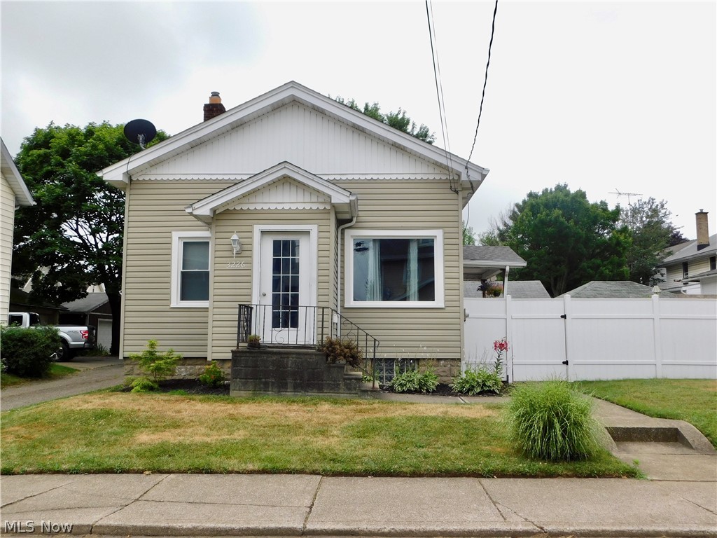 This ranch is just super cute! While it has been updated it still has great charm with curved archways and lots of windows. Wait until you see the fenced in courtyard and covered porch! All of the rooms are bright, sunny and a surprisingly nice size. The kitchen offers stainless appliances 2016 and and the basement has glass block windows. The plumbing has been updated, hot water tank 2015, a/c unit and roof were placed in 2017, windows 2018-2019 and new exterior doors 2020.
You will simply love spending time out back in the courtyard! Don't miss out.. you still plenty of time to enjoy the rest of the warm weather season! Great location included..close to shopping, restaurants, and the highway!