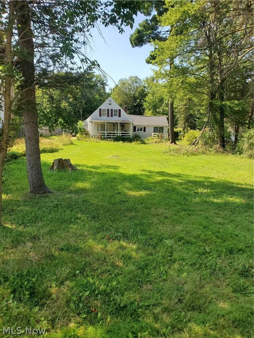 Welcome to this Cozy house in the highly desired Solon School District. When you walk in the front, you will be greeted with a large living room and step up dining room. This is a wonderful home with 3 Bedrooms, and 2 Full baths partially updated eat-in kitchen with stainless steel Appliances. Laundry is on first floor. Private wooded acre lot waiting for you to expand. Extra-large detached garage that can store a large boat or anything else. Raised deck along the side of the house overlooking the garden just waiting for your personal touch. Enclosed porch and a partially fenced in backyard. This home is waiting for its new owner with plenty of value-add options. Schedule your tour today.
