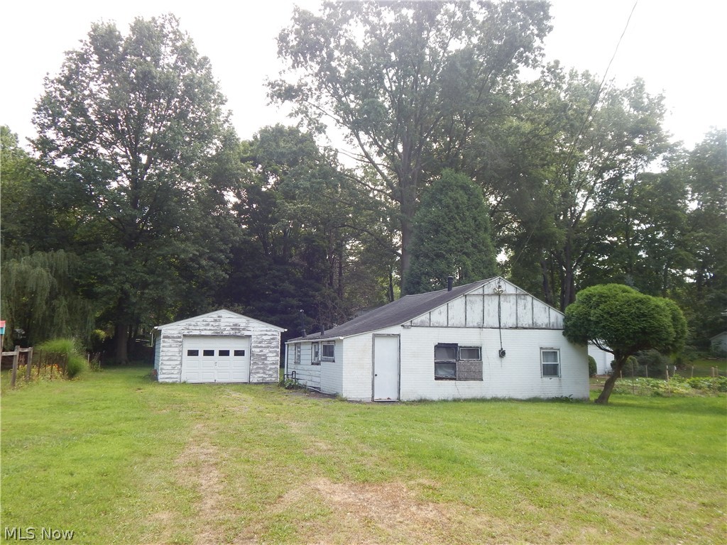 Value is in the Land. Two Bedroom Ranch. needs major TLC. This is for the handyman at hart. Beautiful lot, nice DT garage.