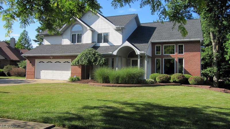 Spectacular Contemporary Colonial built by one of the area's top builders. This home truly shows pride of home ownership. From the moment you approach this beautiful home the quality and care is recognized. Both front and rear yards are professionally landscaped and manicured, with the stone walls installed in 2004. The dramatic back yard was fenced in 2014 with tasteful wrought iron styled fencing that blends into the landscape. The spacious living room features vaulted ceiling and transom windows with open staircase to second floor. There is also an office on first floor off entry and living room. The sunken family room is dramatic with 2 story vaulting and fireplace and is open to the recently updated kitchen which features granite countertops installed in 2012 and refinished cabinetry. Off the family room is a massive wood deck overlooking the beautifully landscaped yard. The lower level of this property is a dream come true with a huge recreation room with beautiful hardwood built