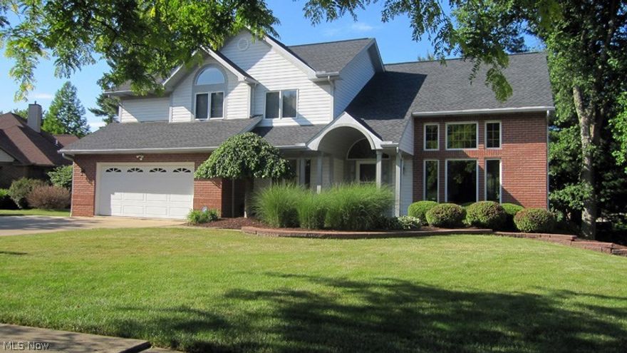 Spectacular Contemporary Colonial built by one of the area's top builders. This home truly shows pride of home ownership. From the moment you approach this beautiful home the quality and care is recognized. Both front and rear yards are professionally landscaped and manicured, with the stone walls installed in 2004. The dramatic back yard was fenced in 2014 with tasteful wrought iron styled fencing that blends into the landscape. The spacious living room features vaulted ceiling and transom windows with open staircase to second floor. There is also an office on first floor off entry and living room. The sunken family room is dramatic with 2 story vaulting and fireplace and is open to the recently updated kitchen which features granite countertops installed in 2012 and refinished cabinetry. Off the family room is a massive wood deck overlooking the beautifully landscaped yard. The lower level of this property is a dream come true with a huge recreation room with beautiful hardwood built