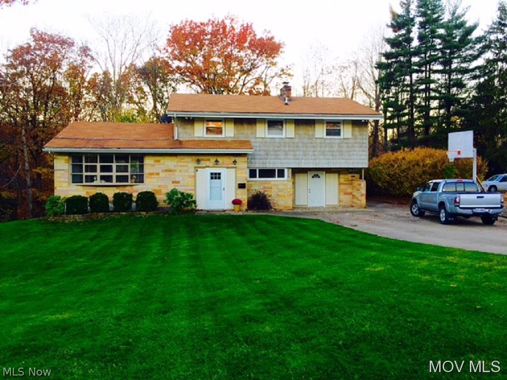 Wonderful Tri-Level House on double lot surrounded by woods and a waterfall. Updates include new A/C, all new flooring throughout the house, fresh paint, updates spare bathrooms, remodeled master bathroom, new stainless LG appliances with double oven and french door refrigerator. Private fenced in back yard with huge deck. 10x16 Amish built storage building. The living room has vaulted ceilings with lots of natural light. Breakfast nook off the kitchen over looks the back yard. Wet bar off the kitchen. Basement could be 5th bedroom or 3rd living area. Tons of privacy! OLREA Elem: Harmar Elementary School Elem/Bus: Y JrHigh: Marietta Middle School School JrHigh/Bus: Y High: Marietta High School High/Bus: Y Fire: CIT Police: CTY PossFreeGas: N ;SQFT=Fin Bsmt:400, Fin Above:2046, Fin Total:2446, Unfin Bsmt:540, Unfin Above:540;PRKG= Off Street, Parking Pad
