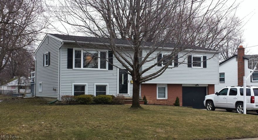 Solid split level in the heart of the Harbor! Totally renovated in 2013. Stunning and practical open floor plan. KIT/LR/DR combination w/handscraped hdwd floors, solid maple cabinetry w/ contrasting island, granite counters, SS sink & appliances. New thermo windows, new exterior doors including a slider to a raised deck, new interior doors & trim throughout. New roof and HW tank. New custom can and drop down lighting and new main panel. Custom baths with tile shower and new vanities with solid surface tops. The 30x18 Master BR could be a bonus living space or in law suite as it has a separate exterior entrance. The spacious fenced yard has a large storage shed and a  2 tier deck with rubberized coating AND a large cement patio. This well cared for home has everything you'd expect...in a MUCH higher priced home. Value, value, value here!