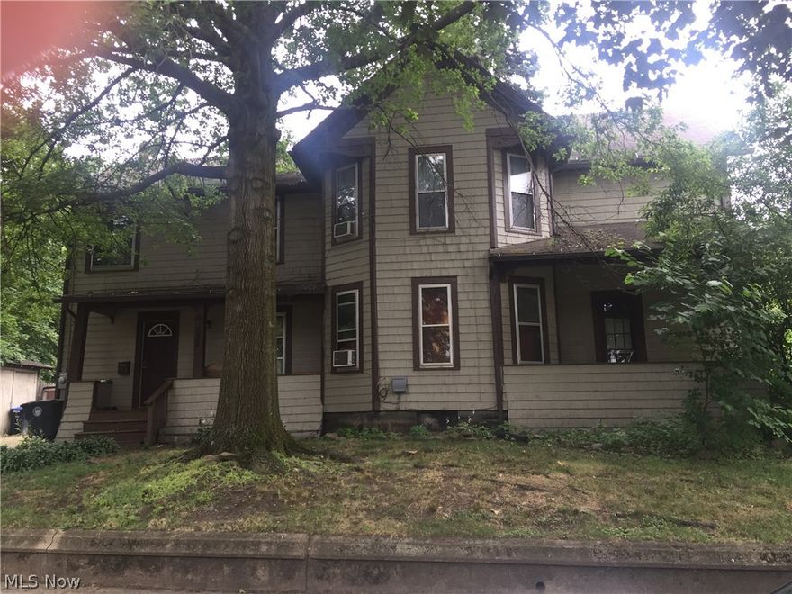 Great investment opportunity in Akron. Charming century two unit home close to all amenities. Each unit has two bedrooms and one bathroom. One unit has washer dryer hookup and was updated with fresh paint and new laminate hardwood floor. Call today for a private showing!