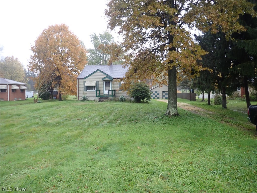Wow! Nearly 2 acres! 3 Bedroom, 1 bathroom home with 2 car garage. Furnace new 2011. Hot water tank 2013. Sump pump 2016. Perfect investment or call it your home with some sweat equity!