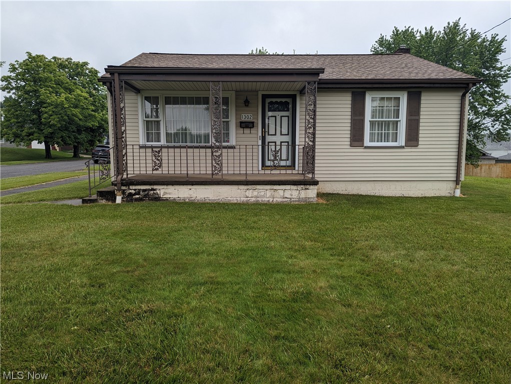 What a cute well maintained home. You enter this Ranch home into the large living room with curved plaster crown molding and hardwood floors throughout. There is a very good sized eat in kitchen with plenty of cabinet space and appliances that stay. Down the hall are the two bedrooms and spacious full bathroom. This home has a full basement with glass block windows and a shower. This space is clean and adds room, just use your imagination. A detached garage and large corner lot finish out this nice ranch home. As Is Sale.