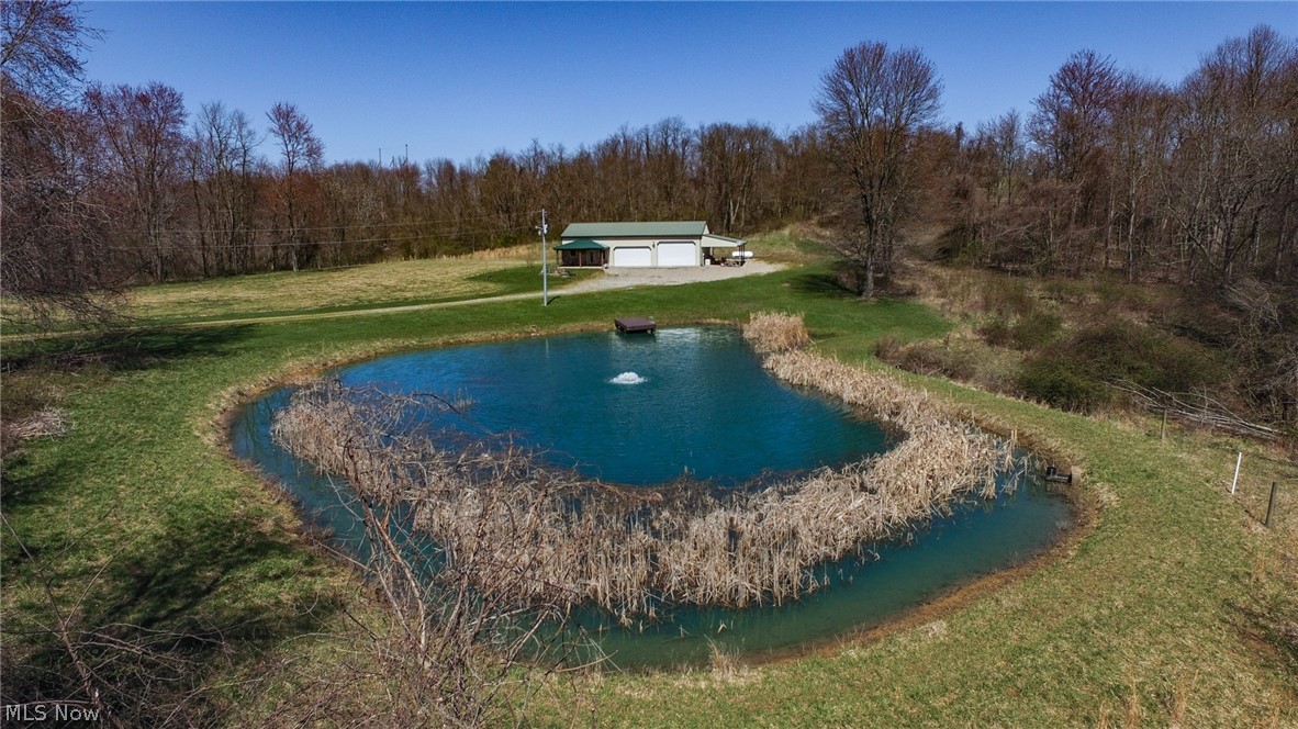 RARE OPPURTUNITY IN LICKING COUNTY!! 185.48 acres with pole barn home and attached shop area. Beautiful 2-bedroom 1 bath with large living room & loft bedroom. Kitchen finished with granite counter tops & hickory cabinets. Hardwood flooring. Custom tile shower with glass doors & tile flooring in bathroom. Gas fireplace with stone hearth. Spiral stair to 2nd loft bedroom. Too much to list! 394.99 TOTAL ACRES AVAILABLE TO PURCHASE AS PACKAGE FOR $5,189,900!