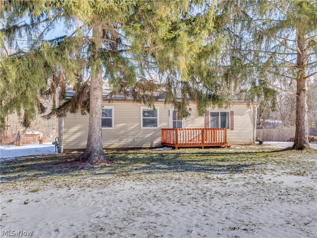 An awesome opportunity awaits you with this Norton Ranch on a wooded 2-acre lot with plenty of room to build that dream garage. New 16x12 wood deck overlooking the scenic wooded rear of the home where you can enjoy plenty of wildlife. This property is located in a country-like setting but is convenient to downtown for shopping and access to the major expressways. Recent bathroom updates include newer bathtub/shower fixtures, commode, and vanity. Newer kitchen cabinets and vinyl flooring throughout most of the home and all appliances stay including the freezer. This property was also a rental property in the past at $800 a month for any potential investors. Needs some finishing touches. Motivated Seller-Make Offer