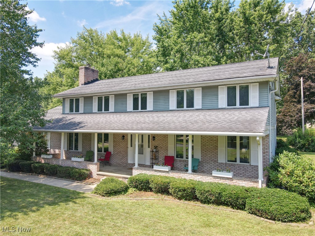 Welcome home to 1243 Danbury Rd. NW in North Canton! This 3,500 square foot colonial offers 5 large bedrooms and 2.5 bathrooms, making it perfect for a large or growing family. The living room and family room feature new, plush carpet and luxurious vinyl planking covers the dining room, kitchen, laundry and half bath. The living room features plenty of space to gather around the cozy, gas fireplace. Enjoy holiday dinners in the formal dining room which has an open flow into the family room, allowing for more space to gather during those special times. The recently updated four-season room features new insulation, sliding glass door, paint and carpet, allowing you a space to relax or keep an eye on kids while they play in the spacious backyard. The large kitchen offers plenty of cabinet and counter space that the chefs in your life will enjoy. An eat-in kitchen, half bath and laundry room complete the first floor. Heading upstairs you'll notice new carpet throughout the hallway and all 5 bedrooms! The primary bedroom features a large walk-in closet while the primary bathroom features newer flooring and lighting. 4 other good-sized bedrooms and the main bathroom finish off the second floor. The partially finished, professionally waterproofed basement features a large 24' x 21' "rec" room with bar area that's perfect for entertaining or an additional bedroom if needed. There's also an 11' x 13' finished area that can be used as an additional pantry area or more storage. The over-sized 3 car garage offers additional storage or workspace. You'll enjoy relaxing on the large front porch at the end of a busy day! Recent updates include a new electrical panel and weather cap, new water softener system, new well pump and pressure tank, new carpet and flooring throughout the whole house, new light fixtures, newer toilets, sinks and faucets in the bathrooms, new kitchen cabinet hardware and ceiling fans in all bedrooms. Contact your favorite realtor to tour this home today!