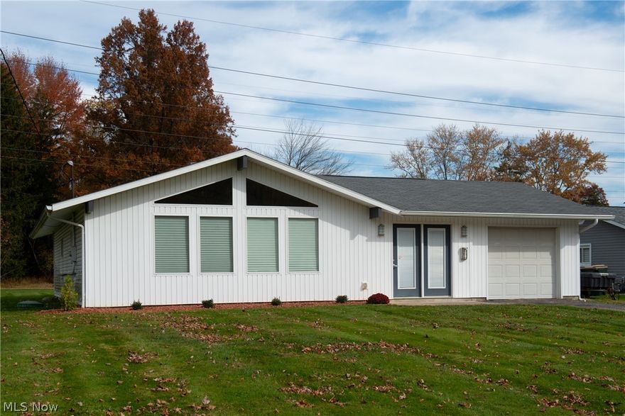 Stylish, pristine and classy finishes are everywhere in this 2 bedroom ranch. The spacious master bedroom and bath provide lots of room to relax and recharge.  An open plan living area with cathedral ceilings boasts a stunning kitchen , cooking island and breakfast bar all with granite counter tops. Dark modern cabinetry pops against the stunning polished porcelain tile.  The 2nd bedroom is right across the hall from the 2nd full bath also beautifully remodeled.  Full laundry room  and office area provides for convenient living with extra storage cabinets throughout. Easy lawn and garden maintenance.  Back patio provides morning sun and afternoon shade. This low maintenance home was fully rewired and plumbed just 10 years ago.  Brand new 200 amp electric service was installed to service a new heat pump and AC unit.  Built in vacuum system makes cleaning a breeze.  Close to Mill Creek Park access and Boardman soccer fields.  Easy access to Boardman, Canfield,  Cornersburg or Austintown.